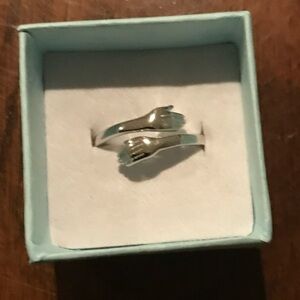 Hands hug ring
